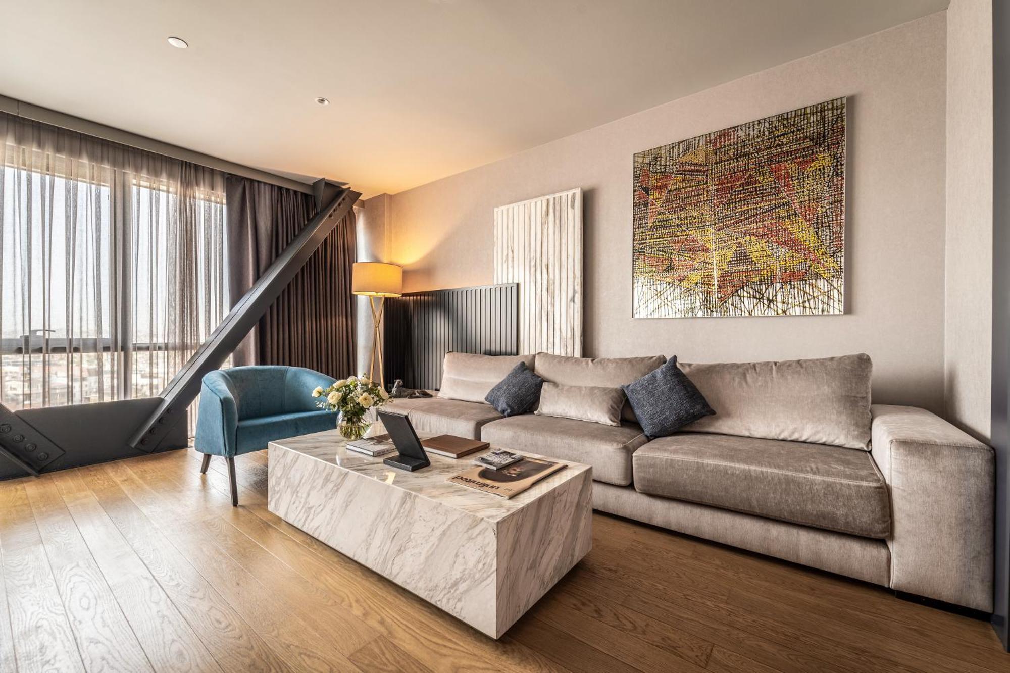 Hotel Sofitel Istanbul Taksim Zewnętrze zdjęcie A living room in a penthouse apartment