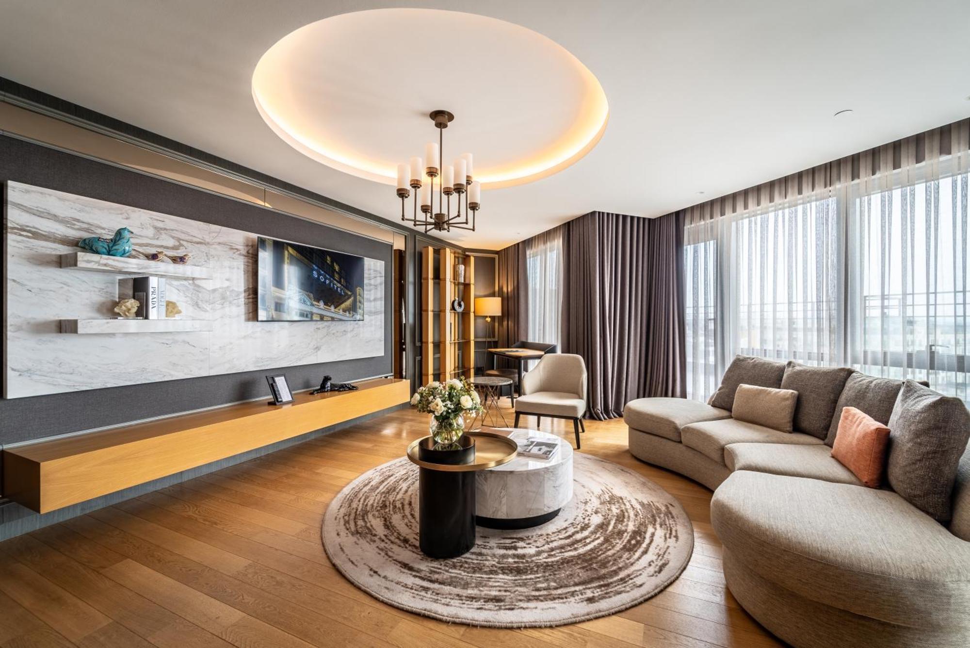 Hotel Sofitel Istanbul Taksim Zewnętrze zdjęcie A living room in a luxury apartment